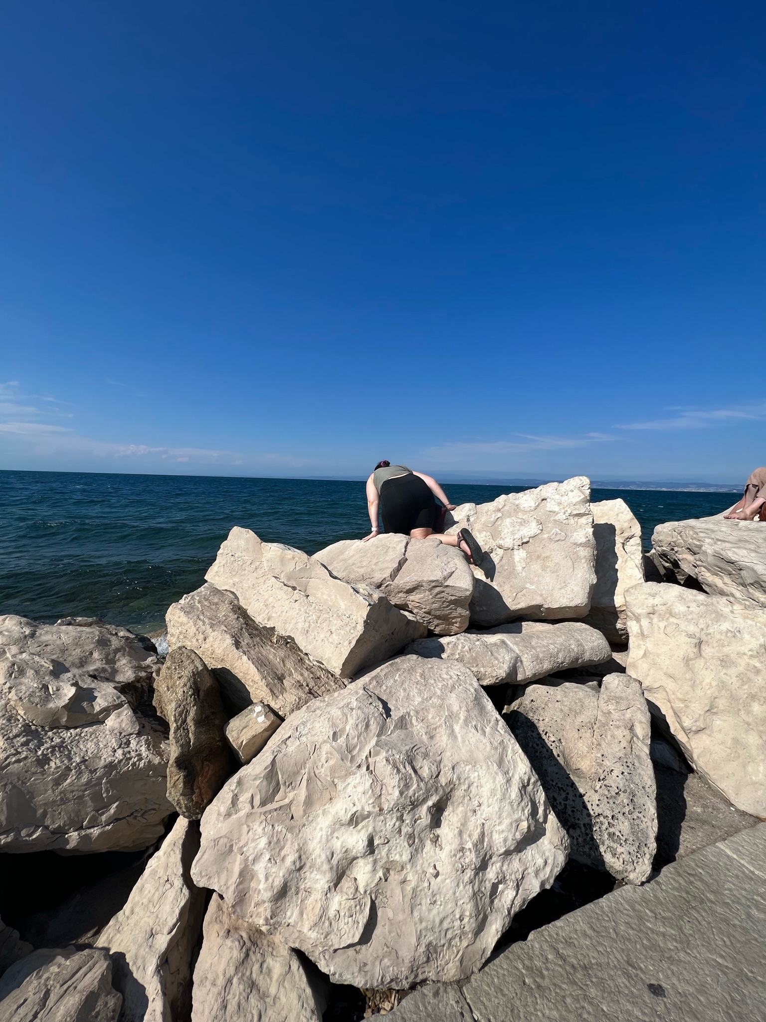 Trieste Adriatic coast with limestone rocks and deep blue water
