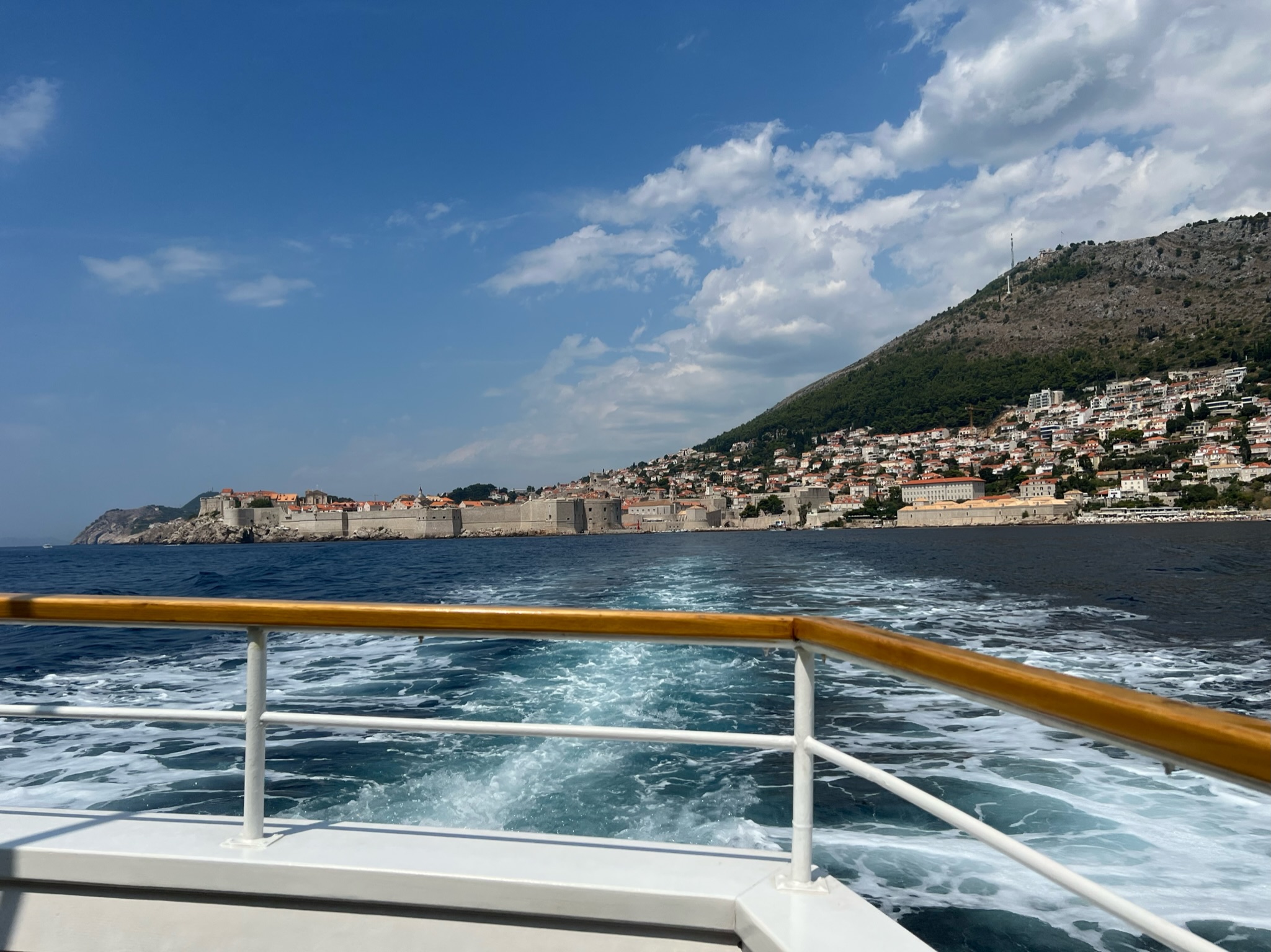Dubrovnik old town and city walls seen from a boat on the Adriatic