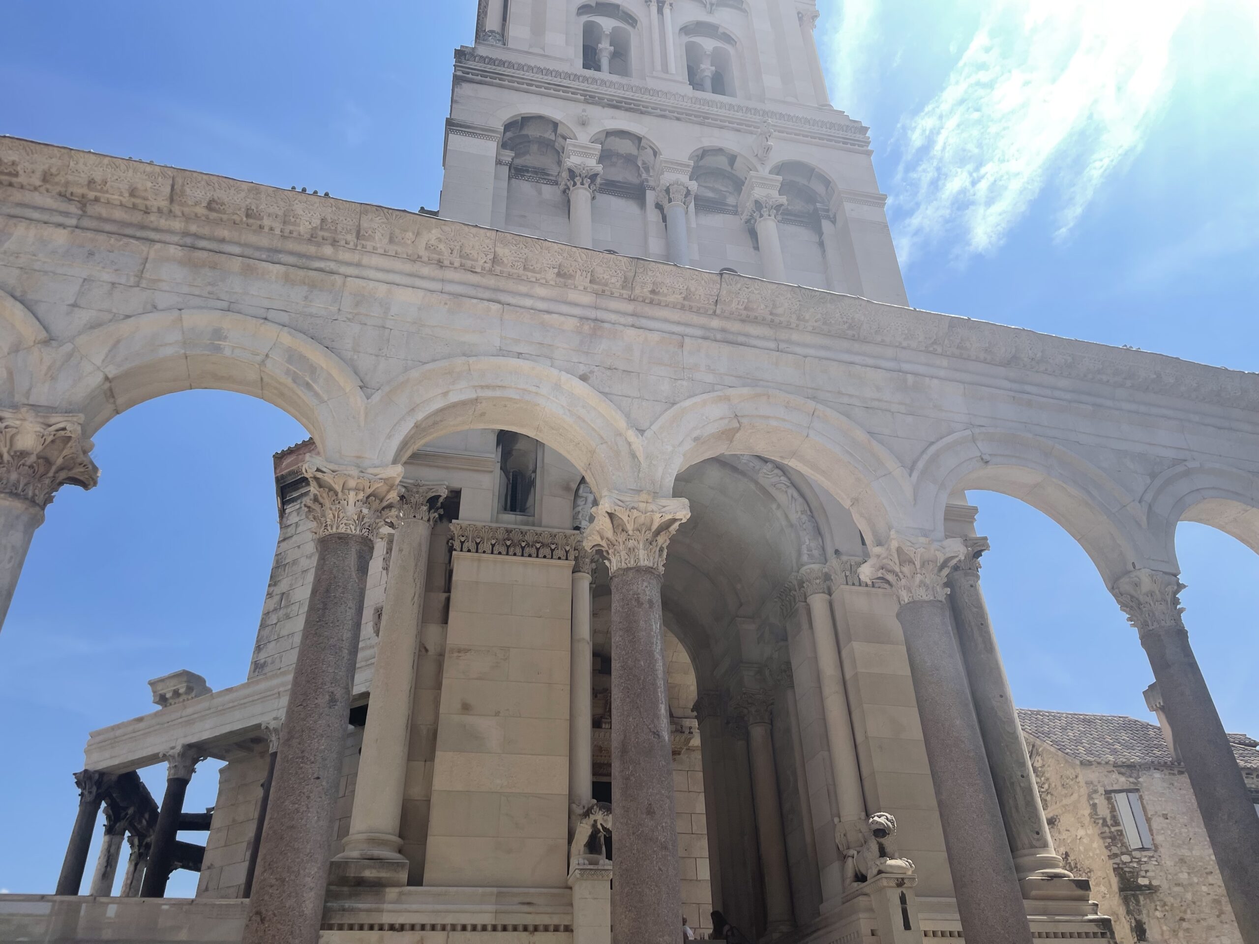 Ancient Roman columns and bell tower of Diocletian Palace in Split Croatia