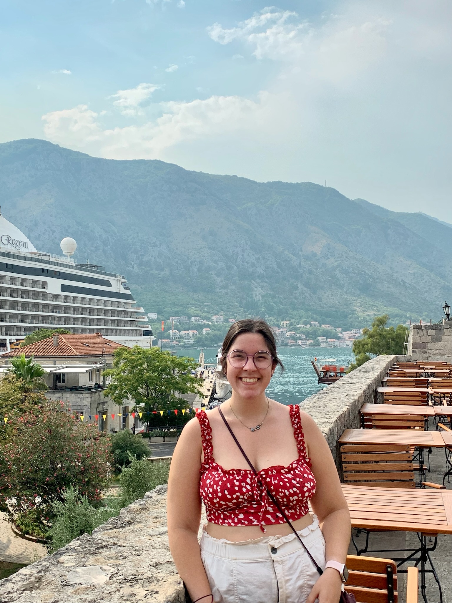 Kotor Bay Montenegro with cruise ship and mountains reflected in the water