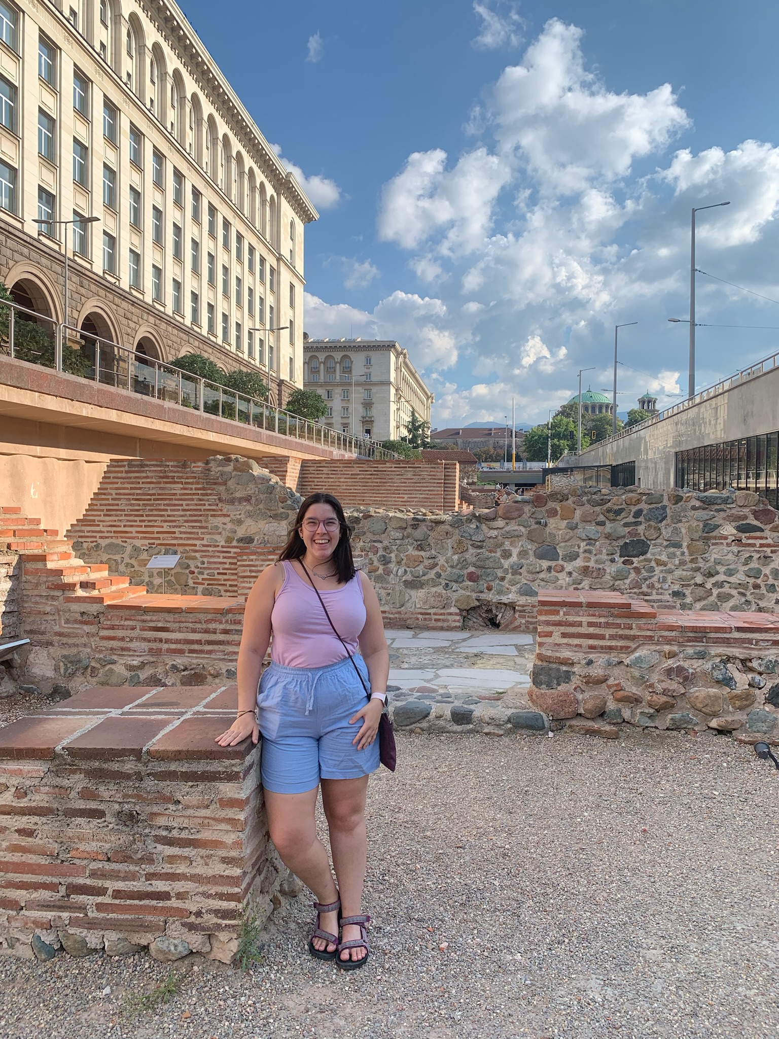 Serdica Roman ruins in downtown Sofia Bulgaria with parliament building behind
